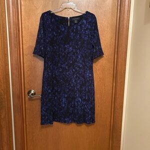 Like new! Stunning TAHARI dress with pockets and built in slip size 12.